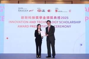 Secretary for Innovation, Technology and In-dustry Professor Sun Dong (right), presents the Innovation and Technology Scholarship to Cheung Tin-wing.