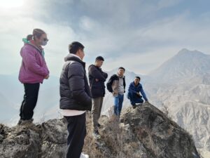 Professor Tan Yen Joe (second right), Dr Zhang Zhen (second left) and Dr Liu Min (third left) recently conducted a field investigation of a slow-moving landslide in Gansu Province.